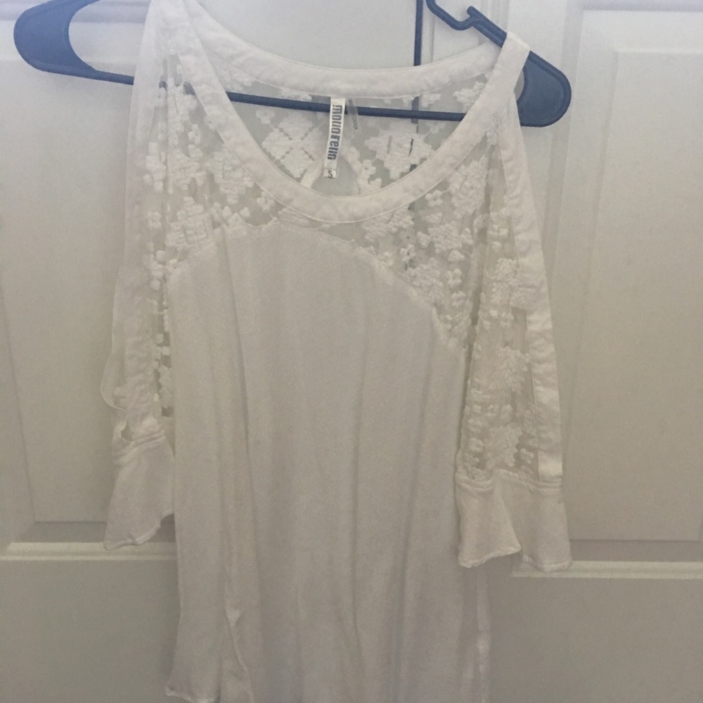 White Top with the shoulders showing.